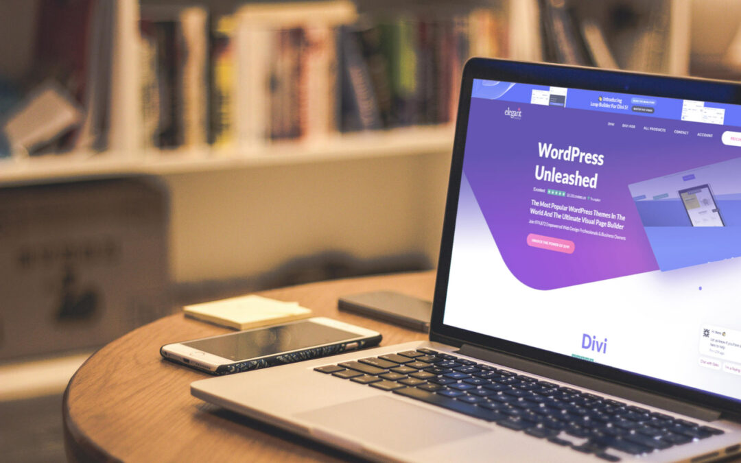 web development computer on a table wordpress